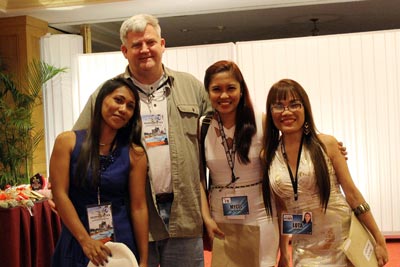 A photo of a foreign man enjoying the company of beautiful Filipino women