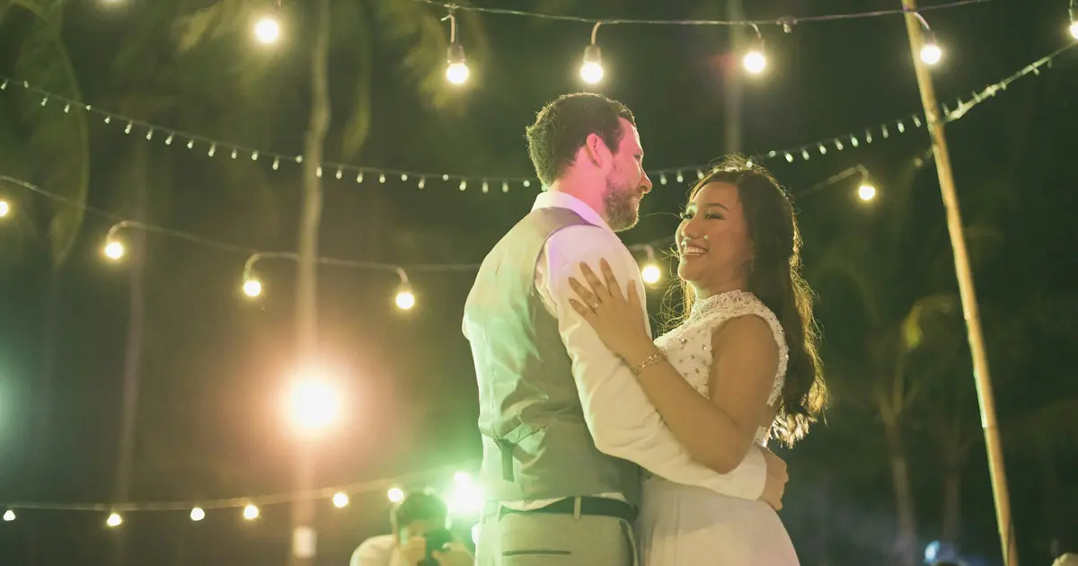 An interracial couple dancing to celebrate their union despite the cultural differences between the Philippines and America